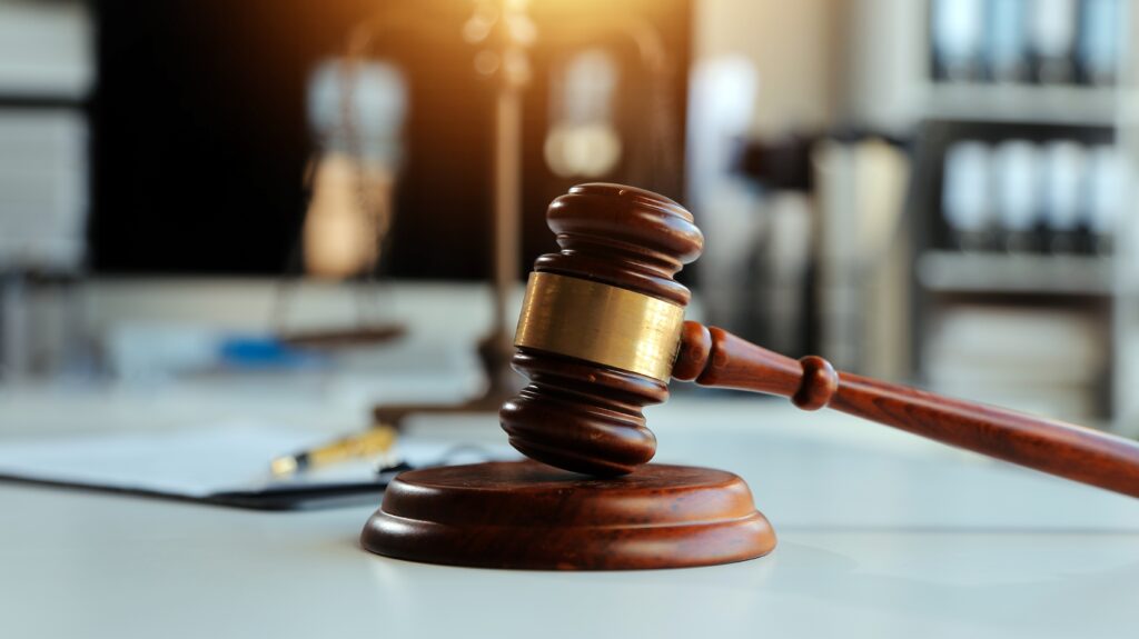 Patient consulting lawyer about a surgical mistake lawsuit.